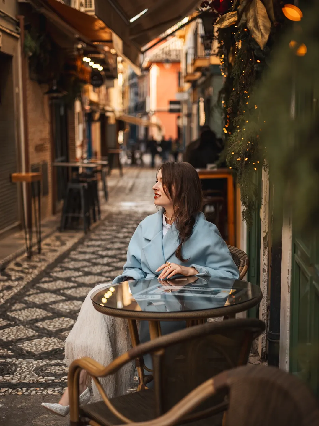 Candlelight illuminating a holiday dinner table