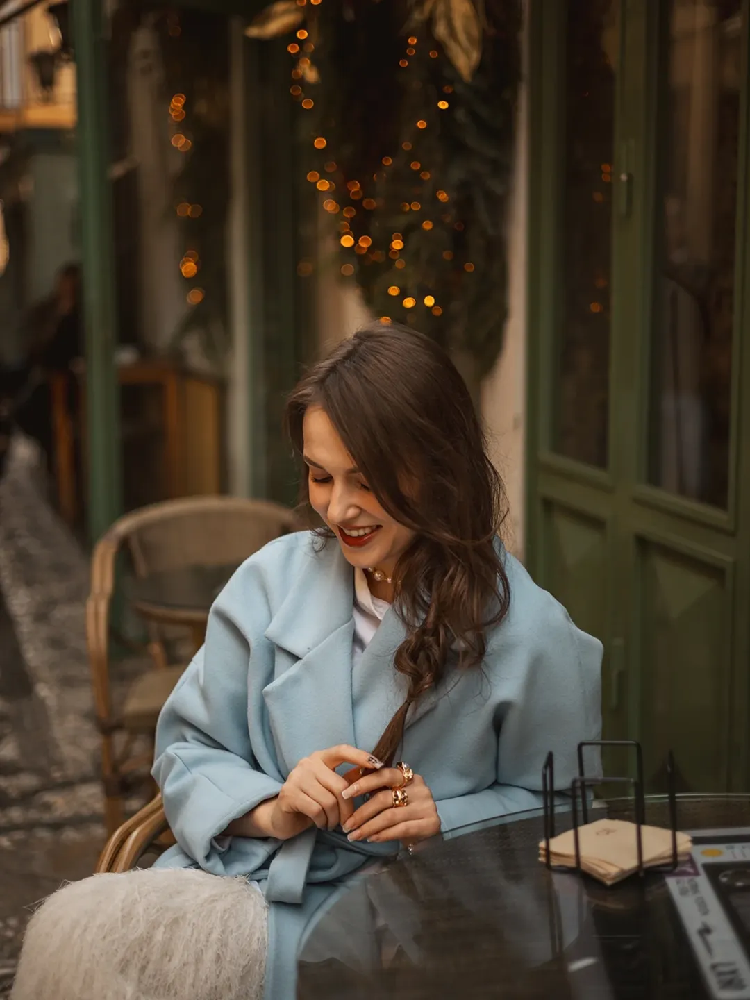 Detail shot of vintage glass ornament on pine branch